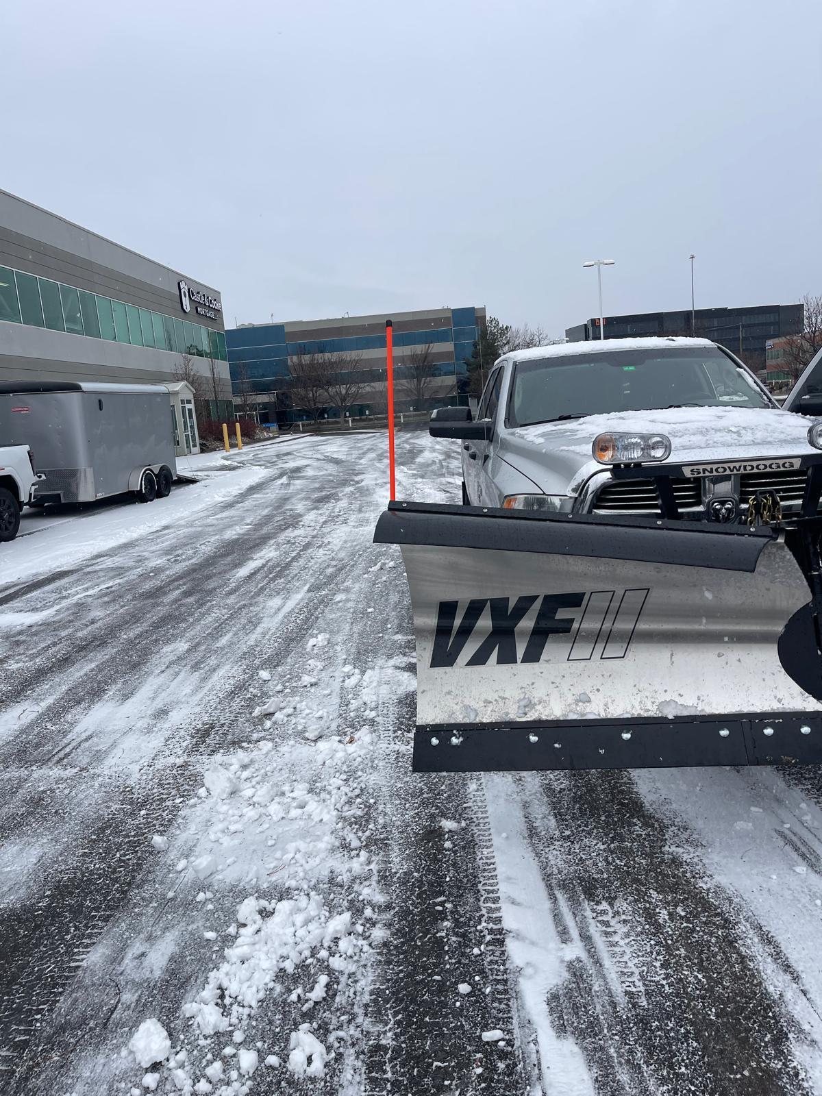 Commercial parking lot plow operation